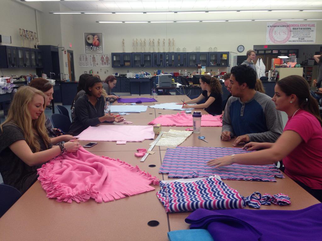 ECS_KY's tweet photo. Making blankets for Georgetown Hospital in biomed. #dosecs15 http://t.co/om2O3efCS6