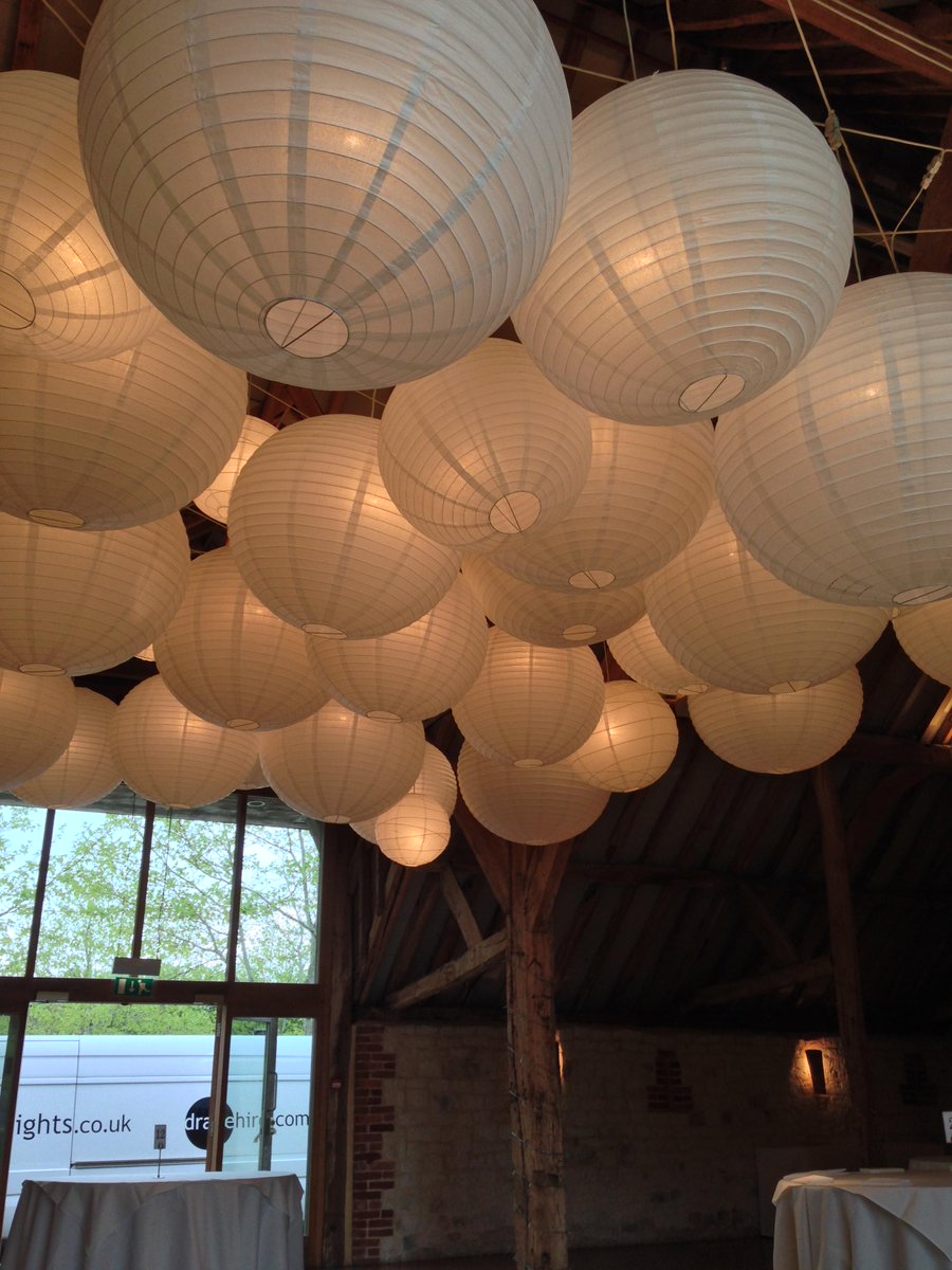 PartyLightsUK's tweet photo. Stunning venue centrepiece @burycourtbarn Classic white #paperlanterncanopy a wow for any #weddingvenue http://t.co/GVTQHLKz2t