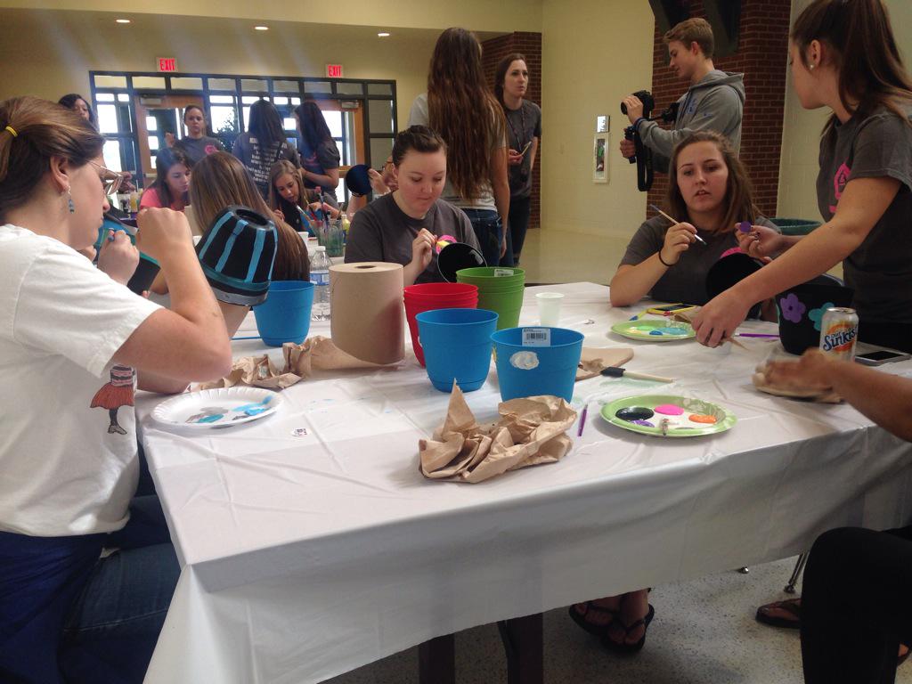 ECS_KY's tweet photo. Painting flower pots for Cardinal Hill. #DOSECS15 http://t.co/EVocyk8aw7