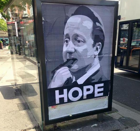 TheDrum's tweet photo. Manchester bus stop adorned with an inflammatory poster subverting Obama's 'Hope' campaign http://t.co/w8WQXvmtQ0 http://t.co/1Xl1gJn0BX