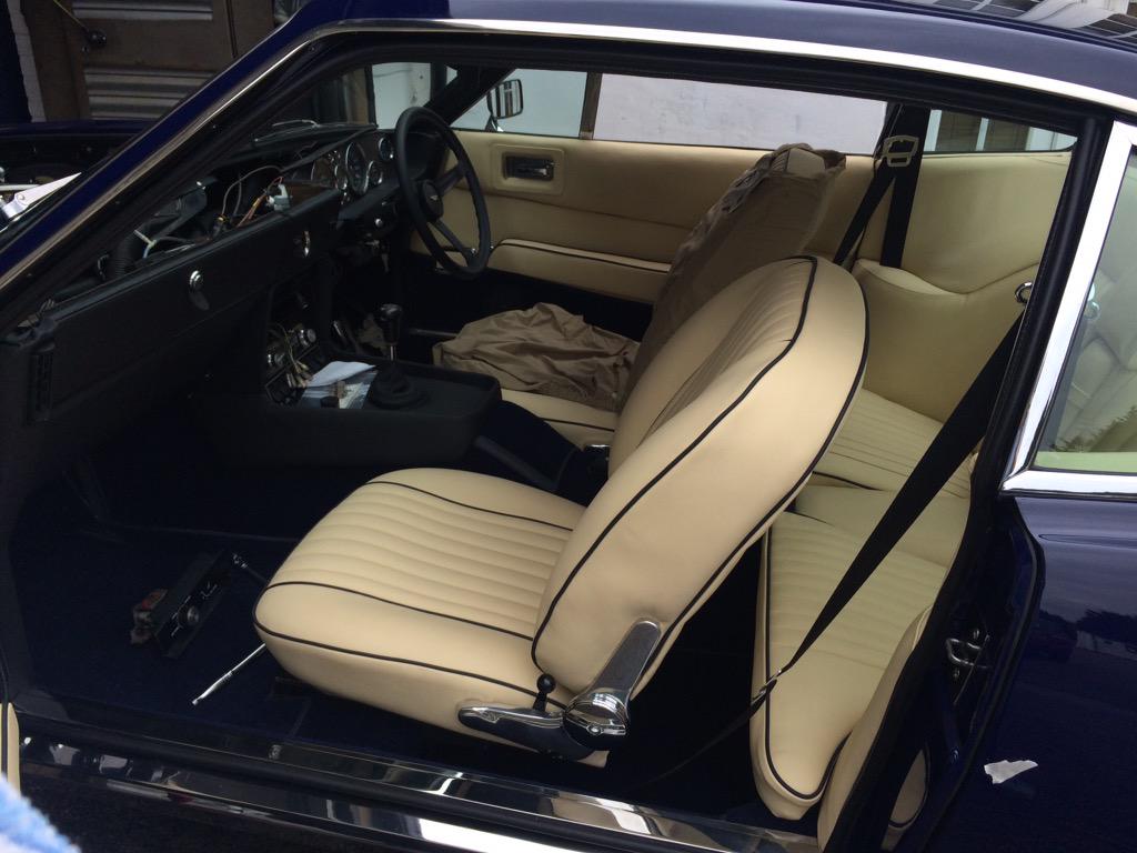 PrestigeSurrey's tweet photo. The leather looks fantastic. Thanks @UKHide magnolia with blue piping on the Aston Martin AM Vantage. #heritage http://t.co/GH4JVne5i2