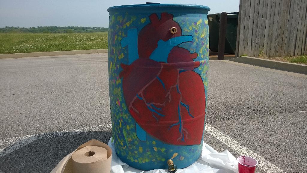 DrJulyeAdams's tweet photo. Rain barrel decor by Biomed #DOSECS15 http://t.co/bU8iQzlql3