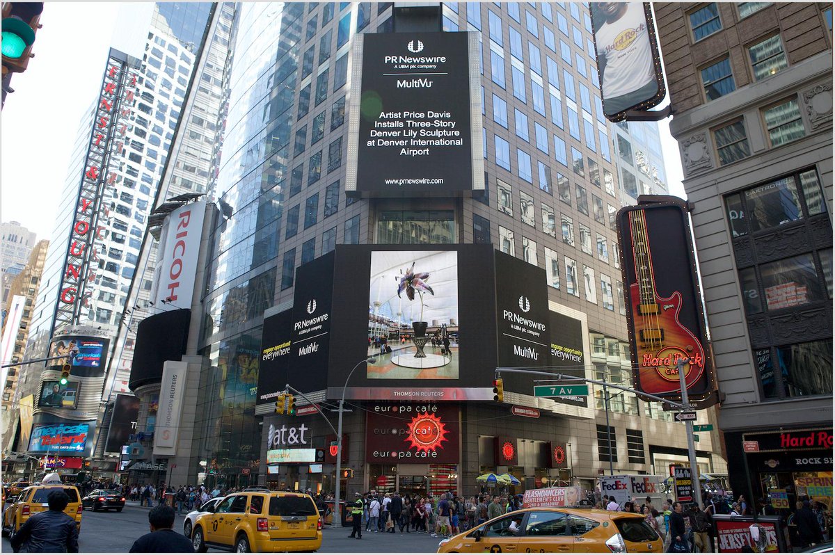 blakecomm's tweet photo. #DenverLily making headlines in #timessquare. View this beautiful work in @DENAirport today! #PriceDavis http://t.co/RRclbvO9YM