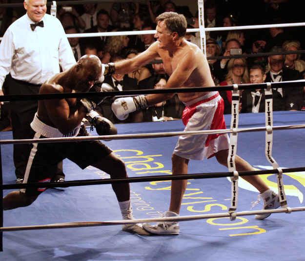 Joy997FM's tweet photo. Former U.S. Presidential Candidate, Mitt Romney fights Evander Holyfield to raise money to for charity http://t.co/4z5EudHAhd