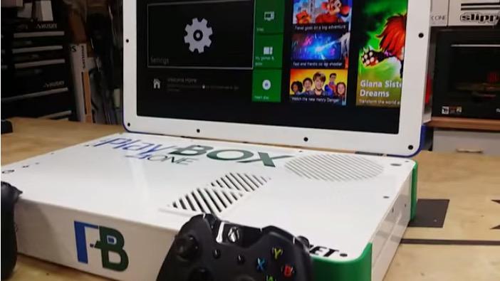 TmarTn's tweet photo. Guy combines PS4, Xbox One, and gaming PC all in one portable device with a built-in monitor 😳 http://t.co/0LdcXFuUc0 http://t.co/RORWlUdlJK