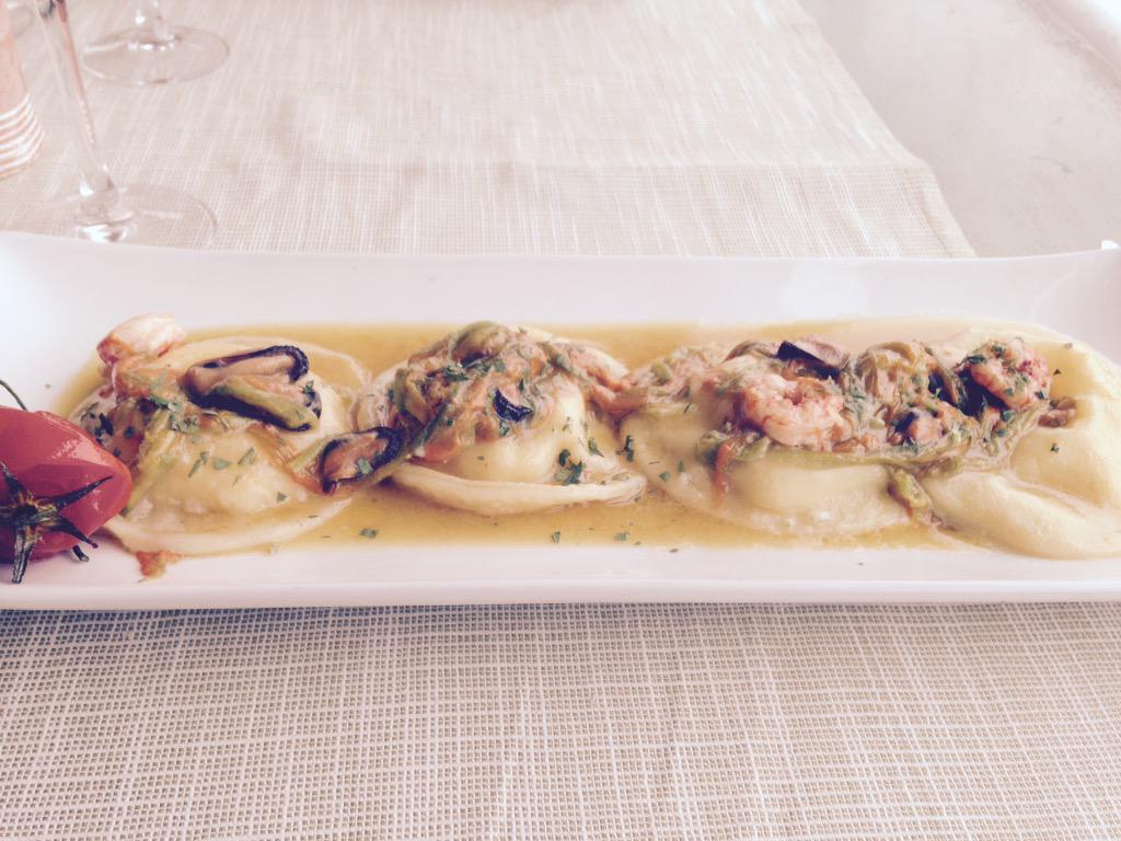 ryannel76's tweet photo. Seafood Ravioli with fresh burrata cheese and sea urchins, clams, prawns, mussels, &amp; squid. I may not leave Italy. http://t.co/De2KxTzPah