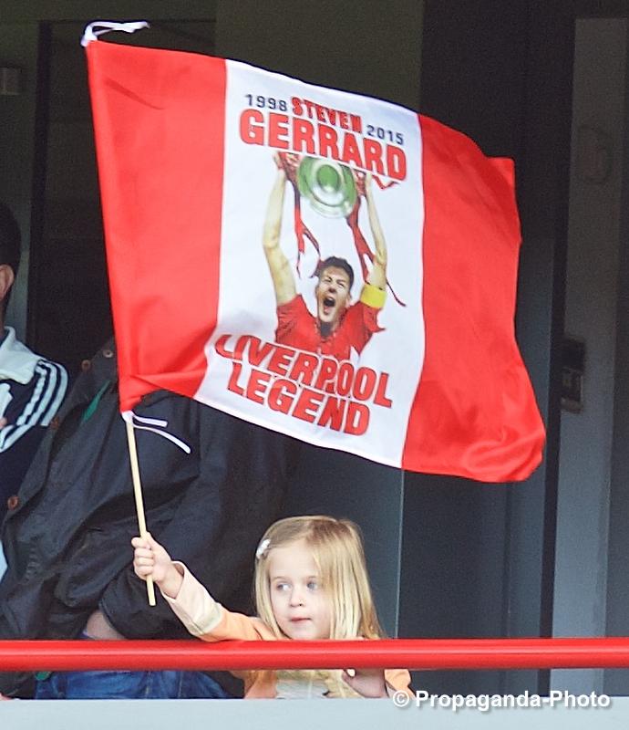 propagandaphoto's tweet photo. Cute pic alert! Steven #Gerrard's daughter flies the flag for the departing captain. #LFC #GerrardsLastGame http://t.co/0ZJzCux2JK