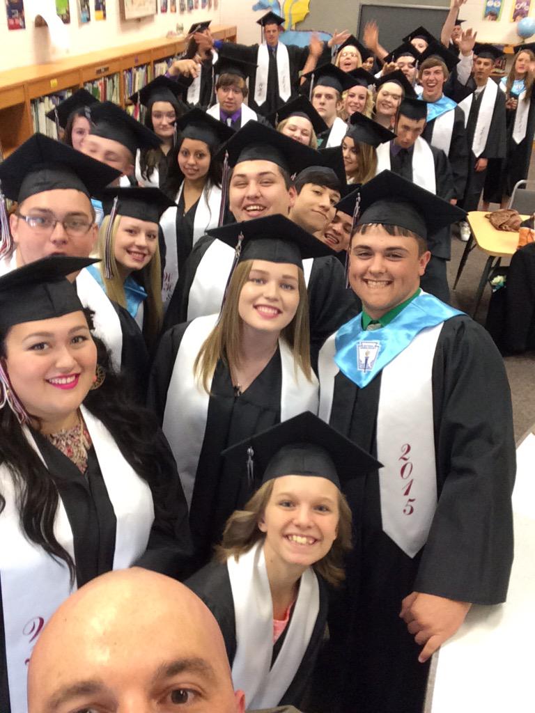 Seniors lined up for their graduation March. Congrats class of 2015! #trojanpride