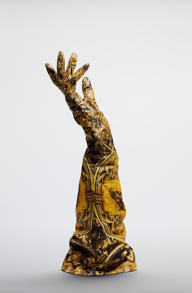 V_and_A's tweet photo. This gauntlet from McQueen’s posthumous collection is printed with details from C15th religious art #SavageBeauty http://t.co/Ry7Viy6SZu