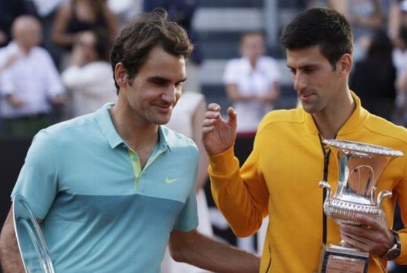 NovakFanClub's tweet photo. This seems awkward. Roger and Nole dduring the trophy ceremony #RomeFinal http://t.co/65iVFGofni