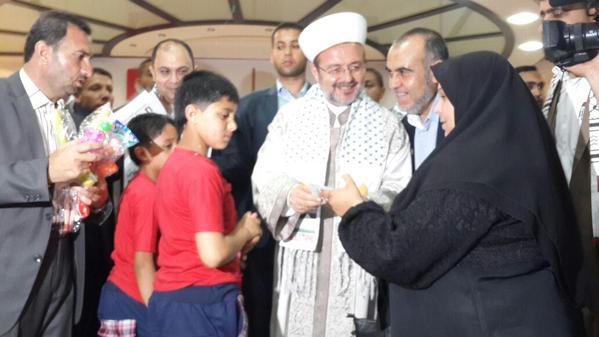 CansuyuDernegi's tweet photo. Gazze'de Cansuyu tarafından yaptırılan Necmettin Erbakan Yetim Merkezi Diyanet  İşl. Bşk. Görmez tarafından açıldı. http://t.co/nBQy1TqhNl
