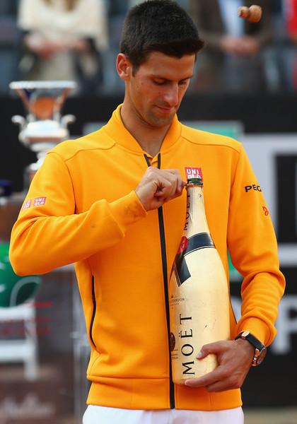 NovakFanClub's tweet photo. . @DjokerNole reaction to hitting his face with the cork (getty) #RomeFinal http://t.co/aBMD4yUyeC