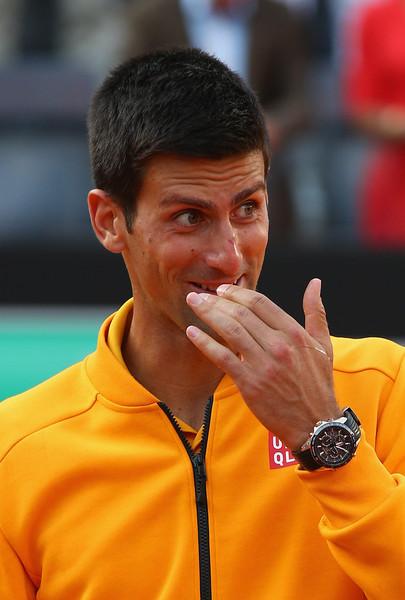 NovakFanClub's tweet photo. . @DjokerNole reaction to hitting his face with the cork (getty) #RomeFinal http://t.co/aBMD4yUyeC