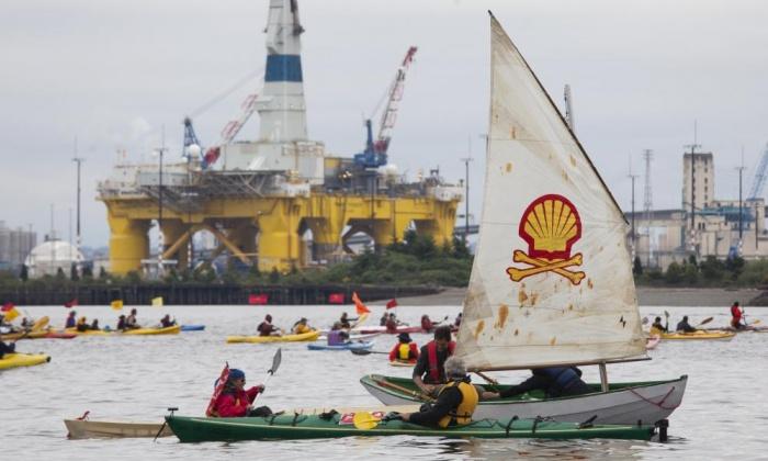 IntactClimate's tweet photo. @Shell accused of strategy risking catastrophic climate change. #arcticdrilling  http://t.co/fDOzBnqYNJ http://t.co/oZPwbSpjPc