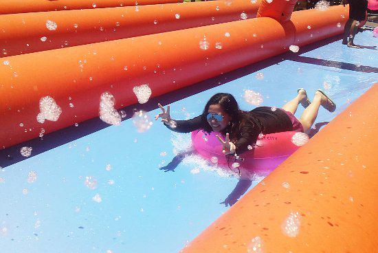 Spotdotph's tweet photo. Missed out on all the Slidefest fun? Check out photos of the 1,000-foot slide: http://t.co/M3h01gOvdD http://t.co/FkFrkvBO2X