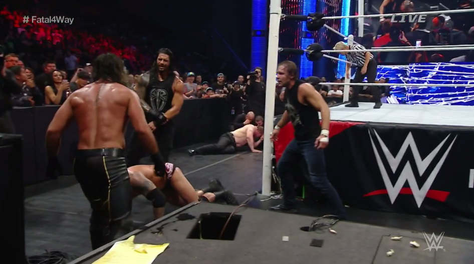 JonMoxleyDotNet's tweet photo. The Hounds attack #WWEPayback http://t.co/xC7b2zdXR8