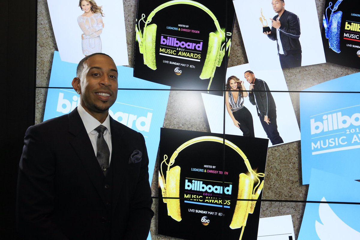 BBMAs's tweet photo. .@Ludacris standing proudly behind his #BBMAsCollage! http://t.co/DWEqXBdk9t