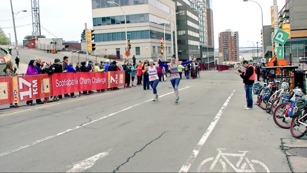 trishsquishface's tweet photo. Myself and @DessieDee crossing the @BNMarathon finish line at 4:26:42. The best running partner a girl could ask for. http://t.co/oL3nhZ4fWB