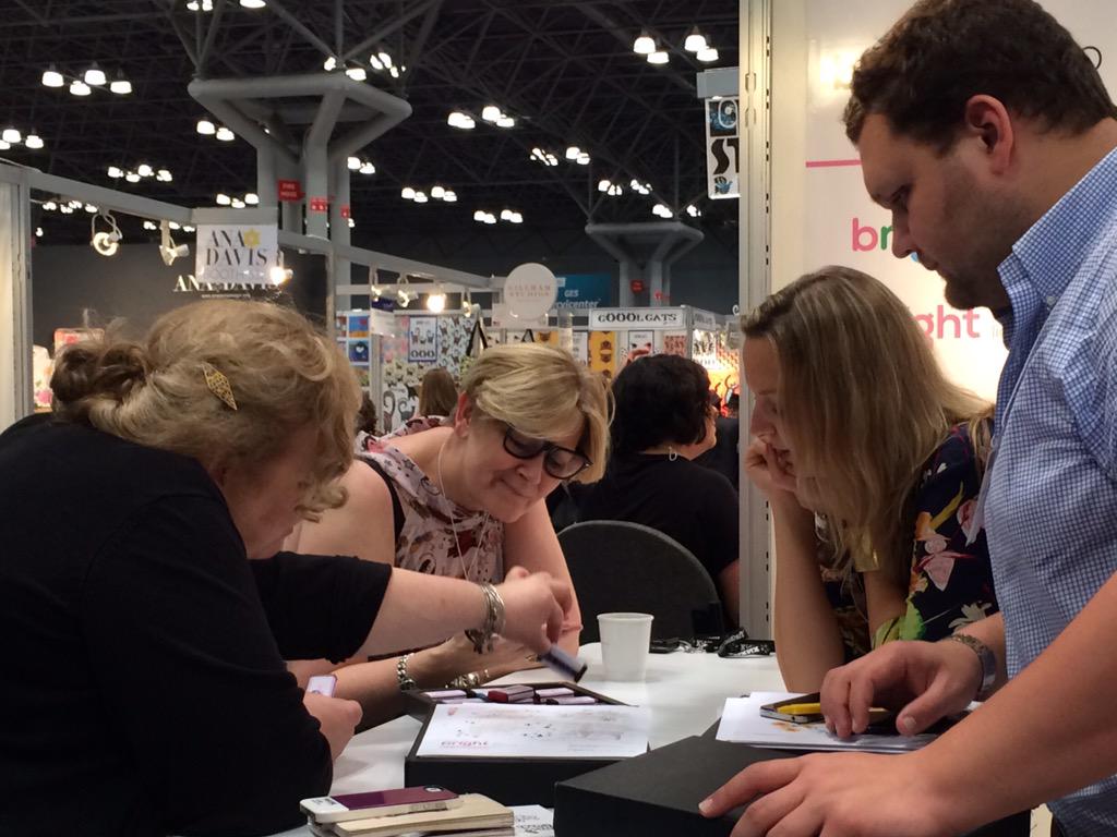 BrightLicensing's tweet photo. Chocolate expert @BrightBurns shows Tracey Bearton and Concord Litho his favorite flavor. #Surtex2015 Booth 533! http://t.co/qg4q1NLlwa