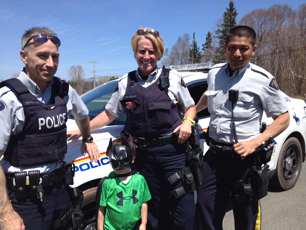 RCMPPEITraffic's tweet photo. We were conducting a check point when a little helper came and asked if he could assist!!! #BatMan #CommujityPolicing http://t.co/oiKwvt7SeV