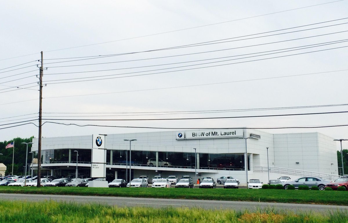 Sloped and curved glass. Storefront and Curtain wall glass. All-Glass office fronts. #BMW #MtLaurel #NormansGlass