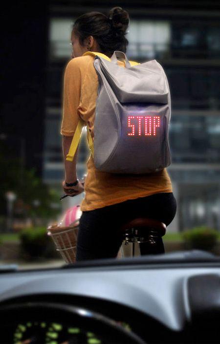 proteus91300's tweet image. SEIL backpack by Lee Myung Su uses LED lights to display traffic signals #Wearable #WearableLed #Led #Technology