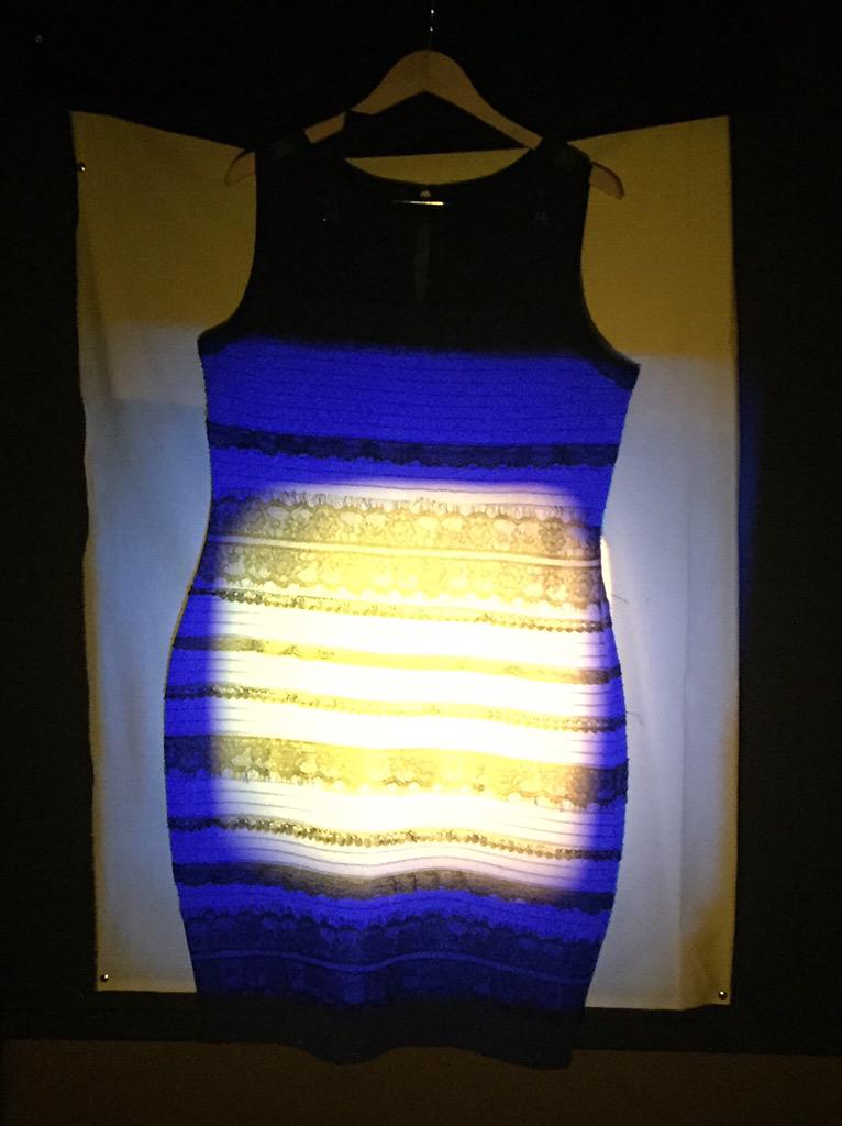 There is an entire room at #VSS2015 devoted to #TheDress -- in blue AND  yellow light, you can see both colors!