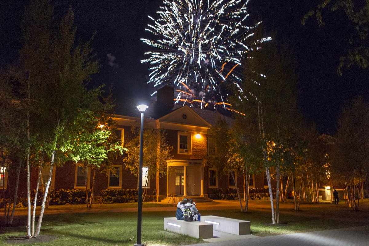BatesCollege's tweet photo. Two friends snuggle on Alumni Walk watching end-of-year celebration #fireworks put on by Sangai Asia #batesshortterm http://t.co/LTG11JEJ63