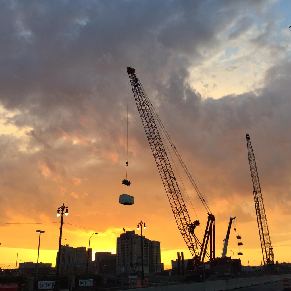 NancyAndrews's tweet photo. The new #Detroit sunset includes construction cranes. I could not resist. #M1 #nofilter http://t.co/Py0HlFHpEc