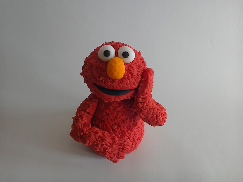 chocbakehouse's tweet photo. Handmade sugar paste Cookie Monster and Elmo cake toppers http://t.co/Z3lkQbDlzP