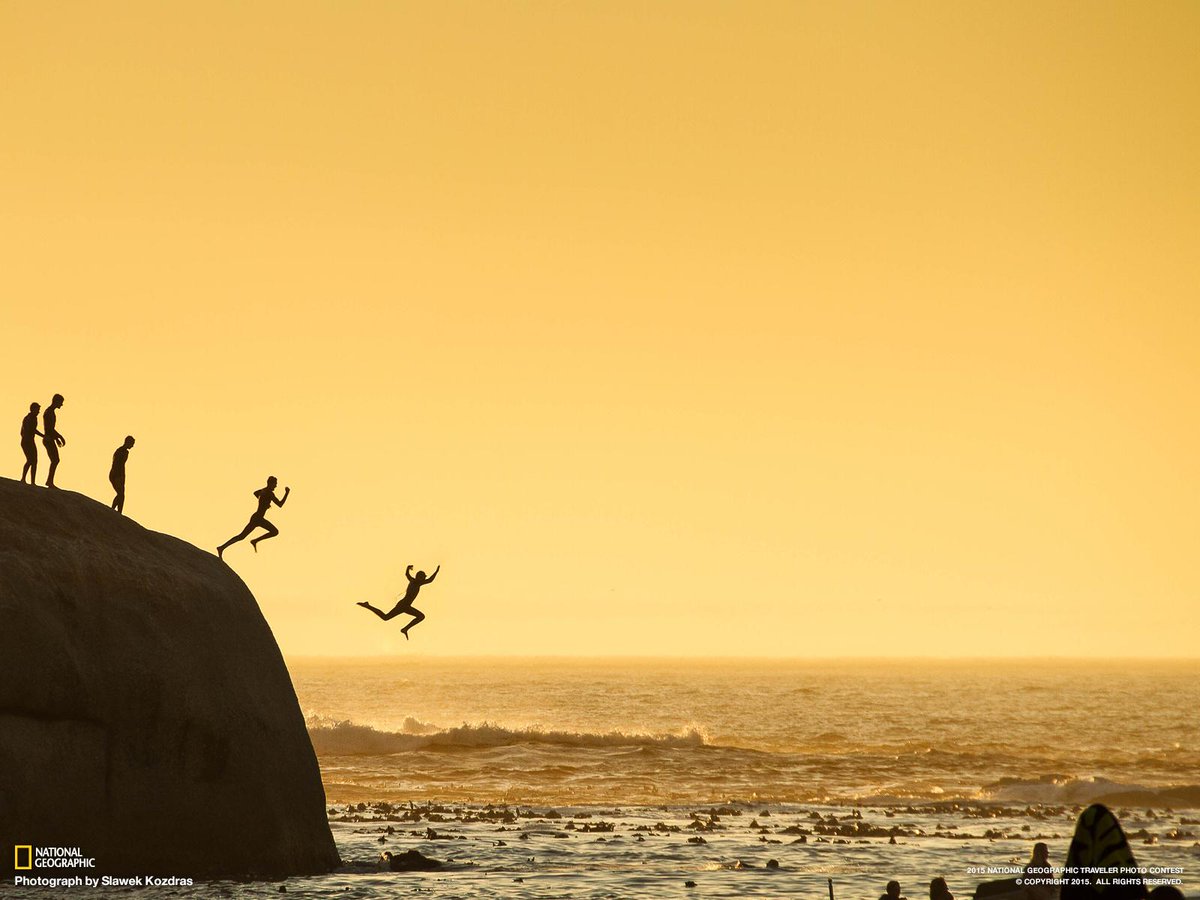 NatGeoTravel's tweet image. Boys jump off Clifton Beach in Cape Town in this photo submitted to the Traveler Photo Contest on.natgeo.com/1FxFkHi