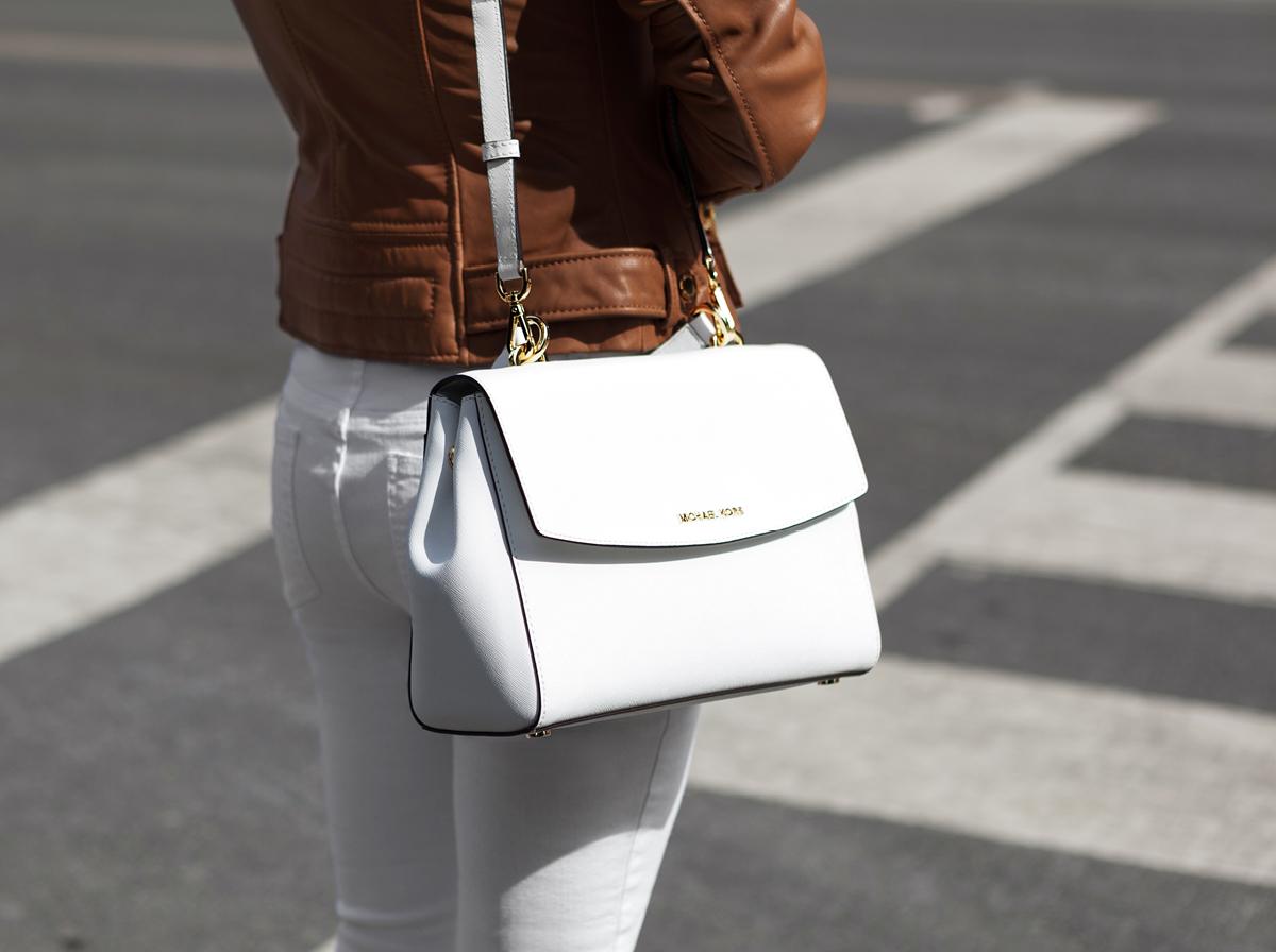 MichaelKors's tweet photo. The Ava bag becomes a street style star with Dylan Penn and @TheCoveteur. http://t.co/VcFXUS9N2C #JetSetToronto http://t.co/YIVNML2aSZ