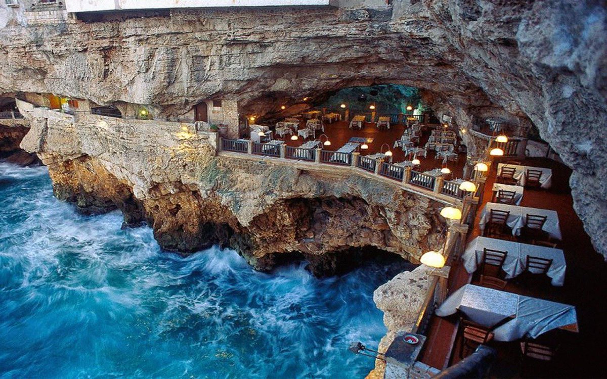 Know's tweet image. Ristorante Grotta Palazzese in Italy, is built inside a grotto.