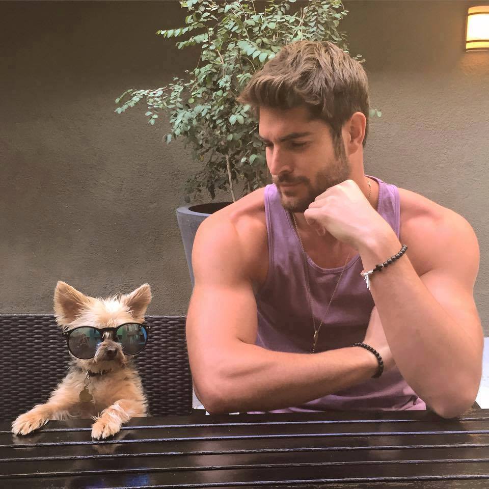 "This, guy looks better than me In glasses.. Adorable too, Don't you think?" He chuckled.