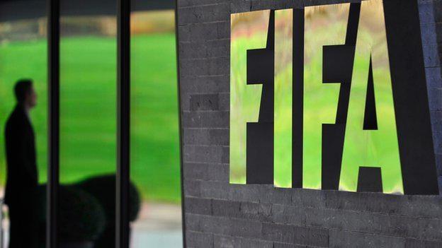 AndyGilder's tweet photo. Never mind the corruption at FIFA, why is that man having sex with a small gorilla? (pic via @BBCSport) http://t.co/8uPKfkJWnx
