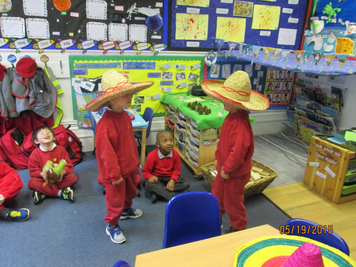 RavenstoneTLG's tweet photo. Some of our Reception children enjoying Mexican day! http://t.co/cTBkzQ683O