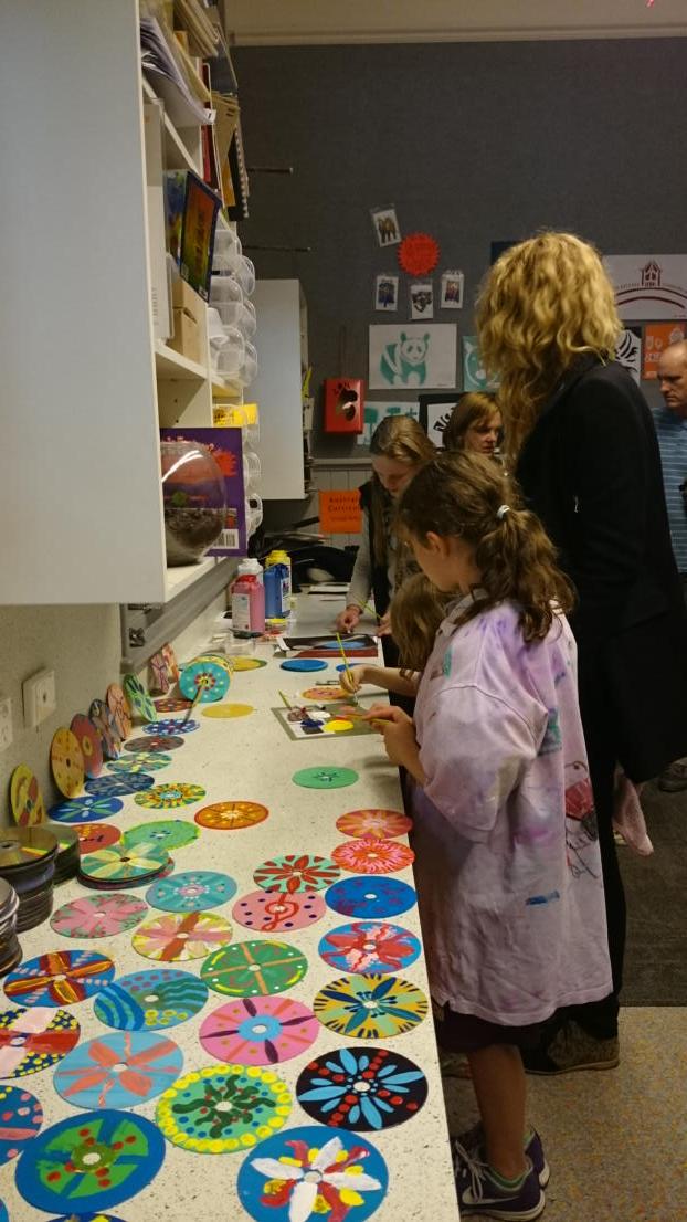 AuburnPS's tweet photo. A great night at Auburn PS! Well over 150 people being scientific - or painting CDs. Great work teachers! http://t.co/m683CI9Nh3