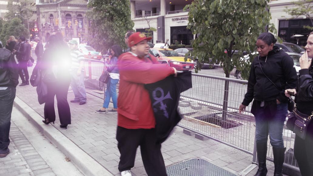 HollywoodKhan_'s tweet photo. Purple baby! the hustle on the streets #PrinceToronto http://t.co/z4hwwDSBrK