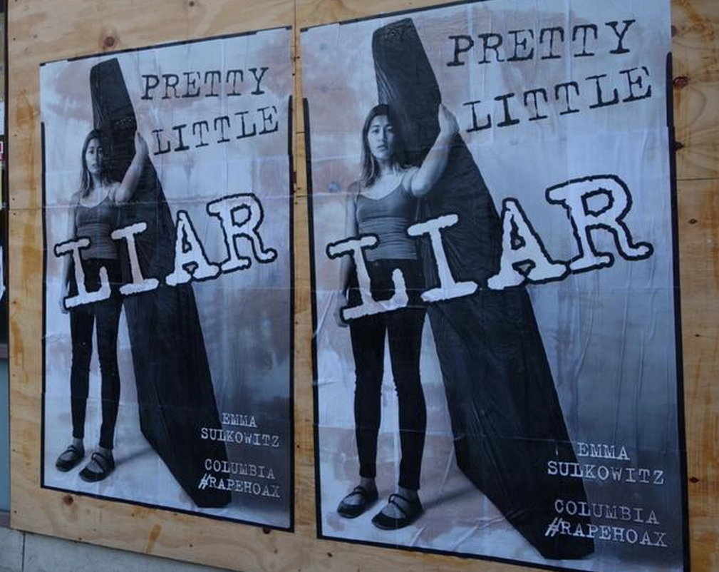 feather_mag's tweet photo. Posters call #EmilySulkowicz "Pretty Little Liar, " after graduation event: http://t.co/bUE9ZHTrZa #CarryThatWeight http://t.co/j9bz6cgYcR