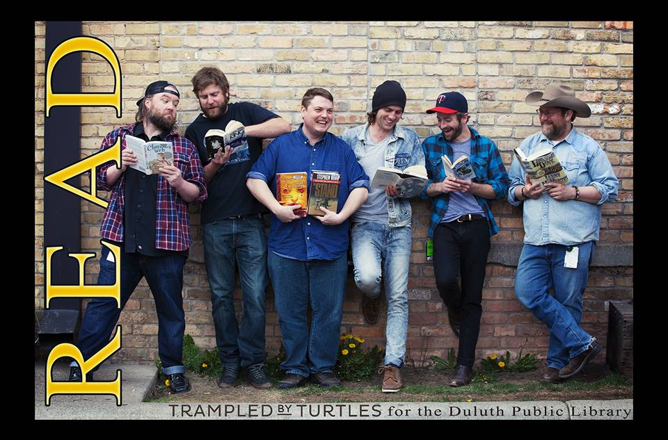 duluthlib's tweet photo. Big thanks to @tbtduluth for posing for this awesome pic. Can anybody name all the books? #READposters #rocknread http://t.co/MTVZkQtyad