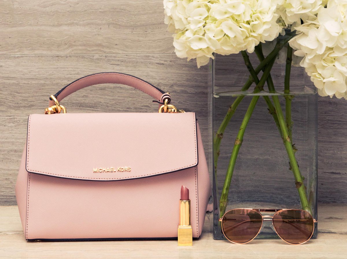 MichaelKors's tweet photo. Shades of pink: A rosy take on our Ava satchel, as seen on @TheCoveteur. http://t.co/5qRrYeCFR7 #JetSetToronto http://t.co/MQ6nEJWo5e