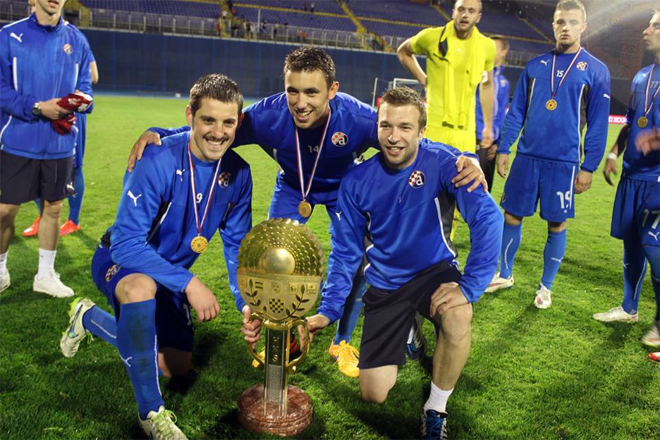 Ademi with the cup trophy Ademi with the cup trophy
