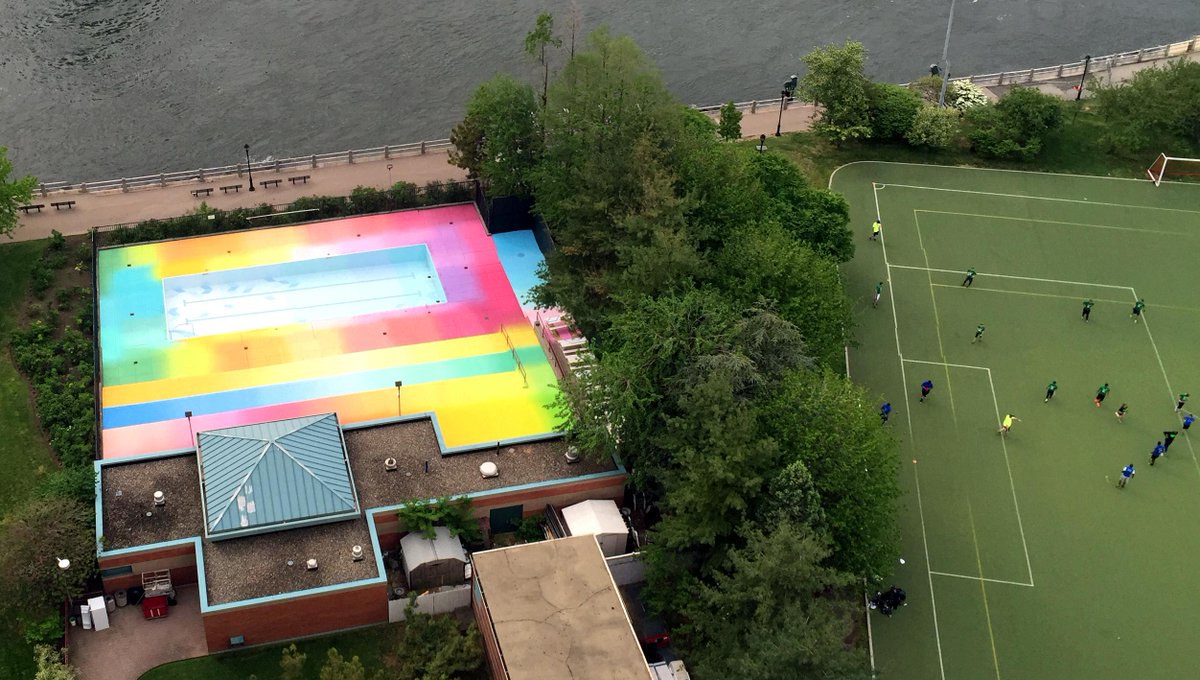 thisiscolossal's tweet photo. A Technicolor Swimming Pool Painted by HOTTEA on New York's Roosevelt Island http://t.co/0OotvIzTKo http://t.co/OjTMtP9sQC