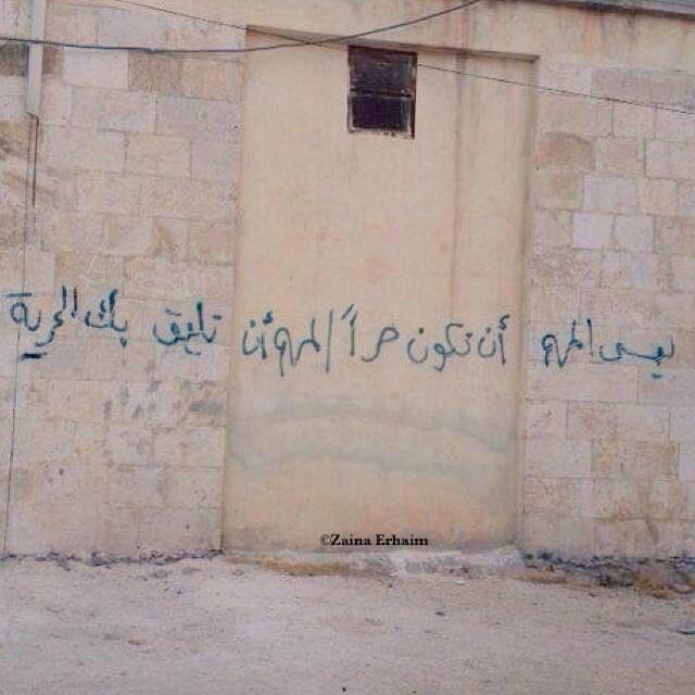 196Roro's tweet photo. و كتب على جدران حره 
ليس المهم أن تكون " حراً " 
المهم أن تليق بك " الحرية " http://t.co/VgvvJ2gzqD