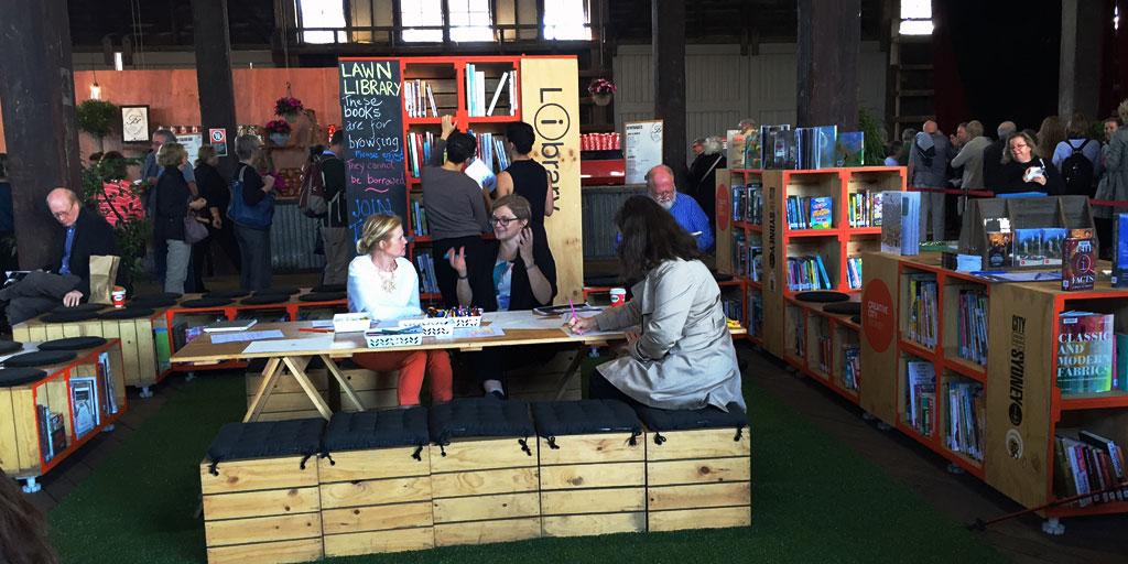 cityofsydney's tweet photo. If you need us, we'll be down at the City of Sydney #lawnlibrary, reading all the books. #sydneywritersfestival http://t.co/o4cYw6dAzI