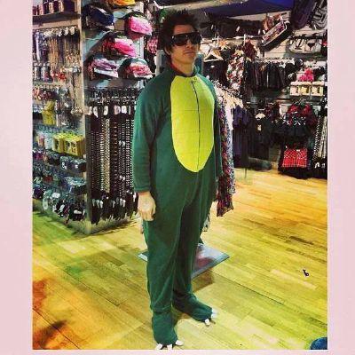 Machine_Sarcasm's tweet image. In case anyone is having a bad day, here is @ptvjaime in a dinosaur onsie.