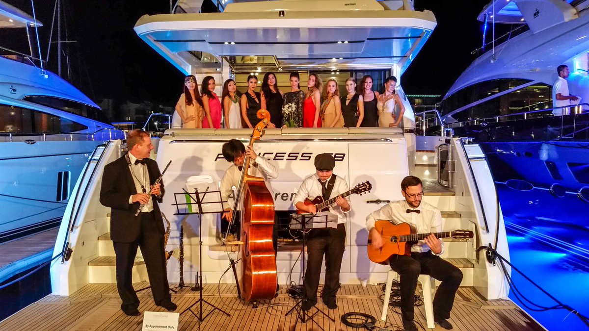 Princess_S_E_A's tweet photo. Celebrating the Asia Premiere of The Princess 68 at the #SingaporeYachtShow http://t.co/Vl1pbRJrtn