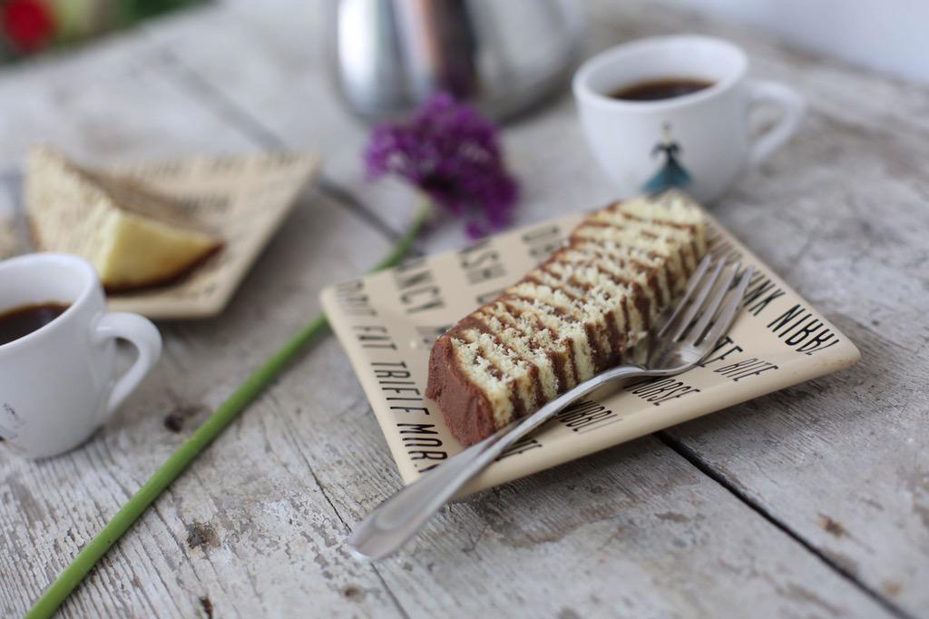 Little layers baked individually, iced, stacked and covered with boiled chocolate icing. #adeepsouthdelicacy #vintage