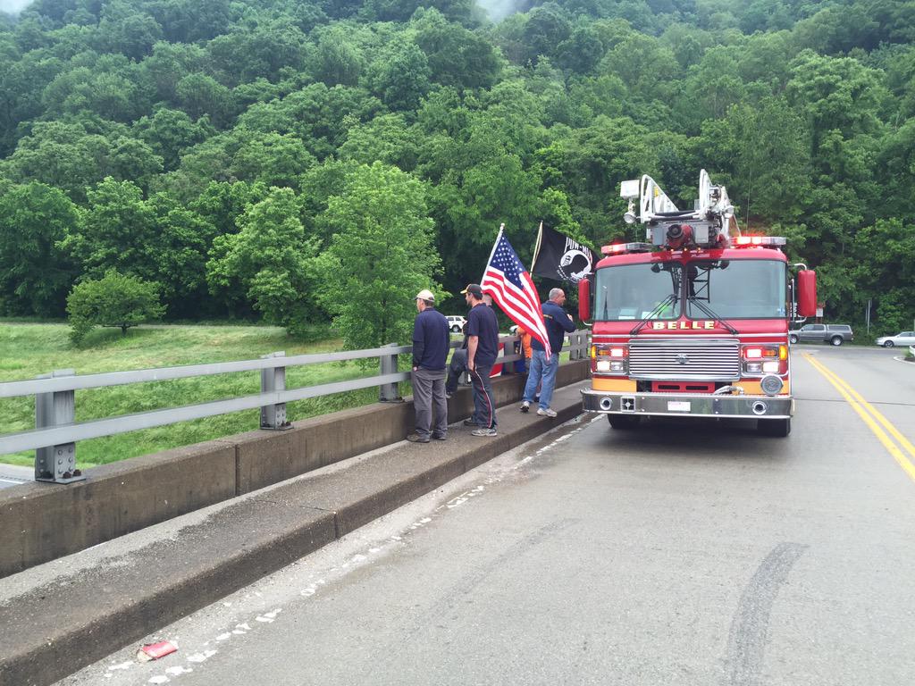 BelleFireDept's tweet photo. Members of the Belle FD and local citizens saluting the annual Ride to the Wall participants. http://t.co/GioShaZgmo