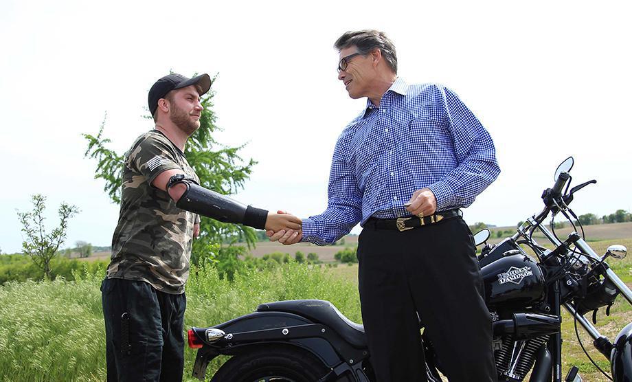 theCHIVE's tweet photo. Governor Rick Perry, an American Hero, and a Harley (Full story here: http://t.co/fVUyCjY78a) http://t.co/aSXvp9Pk11